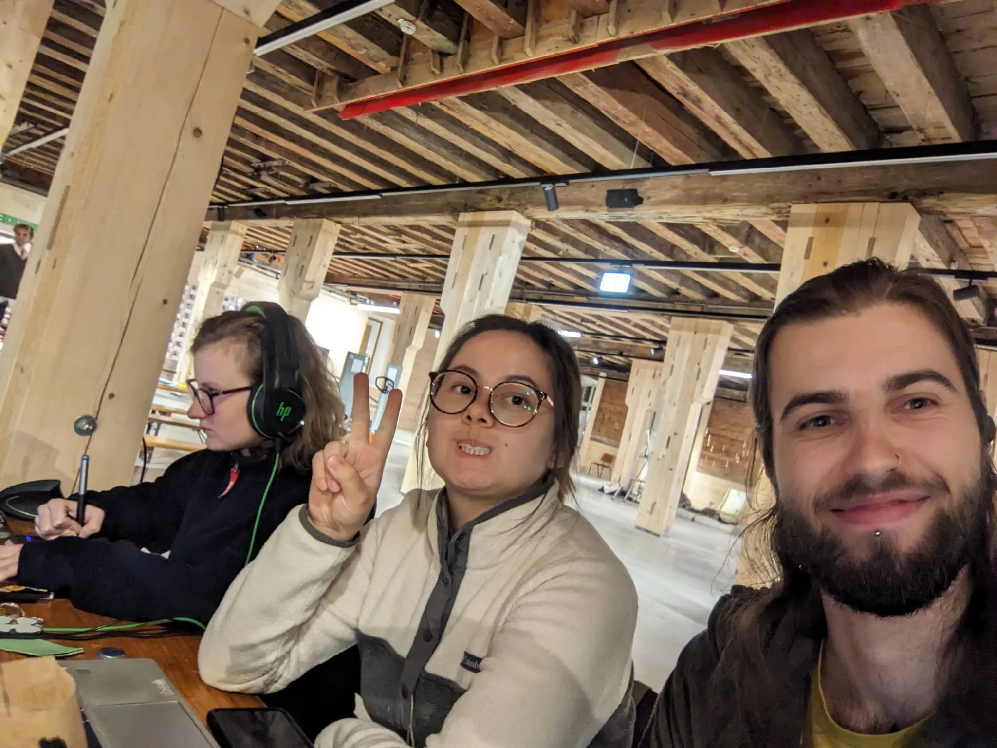 The team with their phones showing Pocket Garden
