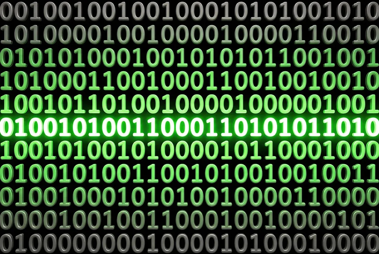 Rows of glowing green binary digits